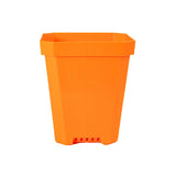 Orange plastic pot on a white background