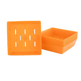 Stack of orange plastic trays on a white background 5X5 Shallow Microgreen Trays