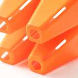 Close-up of orange plastic 4 Cell Plug Tray Inserts