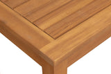 Close-up of a wooden table surface with a white background