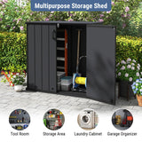 A dark gray multipurpose storage shed with two doors, shown open on a paved patio with garden plants in the background. The shed contains storage bins, a ladder, and garden tools.