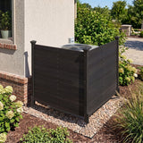 Black wooden privacy screen against a house exterior with garden elements.