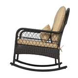 A dark brown wicker rocking chair with beige cushions on a solid white background.