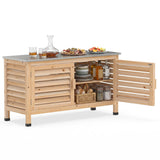 A light natural wood kitchen island cabinet with a gray countertop, shown with its door open to reveal shelves with dishes, bottles, bread, and jars. Decorative food items sit on the counter, and the background is a clean white studio backdrop.
