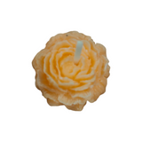 Decorative candle with a wavy design on a white background