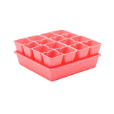 Pink seedling tray with multiple compartments on a white background 4 Cell Plug Tray Inserts