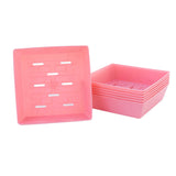 Set of pink 5X5 Shallow Microgreen Trays on a white background