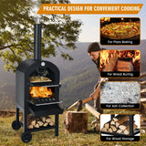 Outdoor wood-fired pizza oven with a person preparing pizza, surrounded by nature.