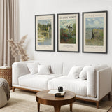 Living room with a white sofa, wooden coffee table, and framed Monet Set of 3 Printable Exhibition Posters on the wall.