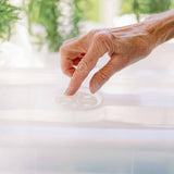 Hand pressing a button on a Propagation Kit | For Cuttings, Seedlings and More