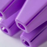 Close-up of purple plastic 4 Cell Plug Tray Insert