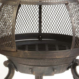 Close-up of a Rustic Outdoor Steel Cast Iron Chimenea Wood Fire Pit with mesh design on a white background