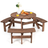Wooden picnic table with benches on a white background