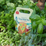 Seed ball kit packaging with pizza design surrounded by green plants