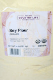 Package of Country Life Organic Soy Flour on a beige background