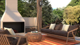 Outdoor patio with fireplace, sofa, and chairs in a garden setting Stripes Warm Brown