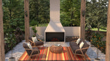 Outdoor patio with fireplace, chairs, and a Stripes Warm Brown striped rug in a garden setting