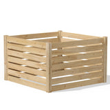 Wooden compost bin on a white background