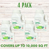 Four bottles of Thick Bee Lawn Seed Kit on a wooden surface with text indicating coverage and pack size.