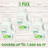 Three bottles of Thick Bee Lawn Seed Kit on a wooden surface with text indicating '3 Pack' and coverage area.
