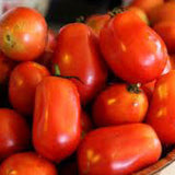 Close-up of ripe red tomatoes in a wooden basket TOMATO Seeds, Roma 