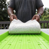 Person holding a lHemp Grow Mat