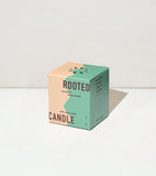 Boxed candle labeled 'Rooted' on a white background Rooted Candles Planters