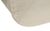 Close-up of a beige fabric surface with a subtle texture