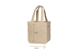 Beige tote bag with measurement markings on a white background
