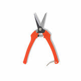 Orange-handled pruning shears on a white background