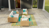 Outdoor patio set with wicker furniture on a Turkish Aqua rug