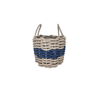 Woven basket with blue and gray pattern on a white background