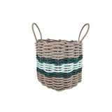 Woven basket with handles in beige, green, and white stripes on a white background