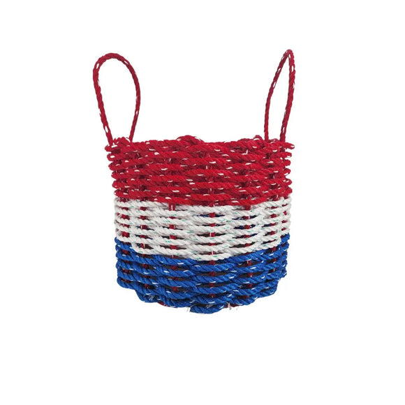 Woven basket with red, white, and blue stripes on a white background