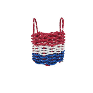 Woven basket with red, white, and blue stripes on a white background