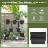 Black planters with a stand on a patio, featuring upgraded glass fiber reinforced PP material.