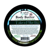 Body butter container with label featuring 'Saplicity' brand and product details.