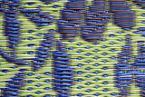 Close-up of blue and green Wildflowers Eggplant woven pattern