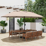 Beige patio umbrella over a wooden dining set on a deck with plants and string lights in the background.