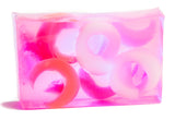 Pink and white swirl soap bar on a white background