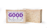 Bar of soap with a label reading 'A Slice of the Good Life' on a white background