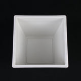 White square container on a black background