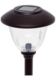 Solar-powered outdoor light fixture on a white background