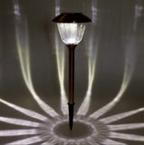 Solar-powered outdoor lamp with a dark background