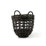 A dark brown woven wicker basket with two loop handles, shown on a clean white background.