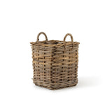 Wicker basket with handles on a white background