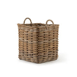 Woven basket with handles on a white background