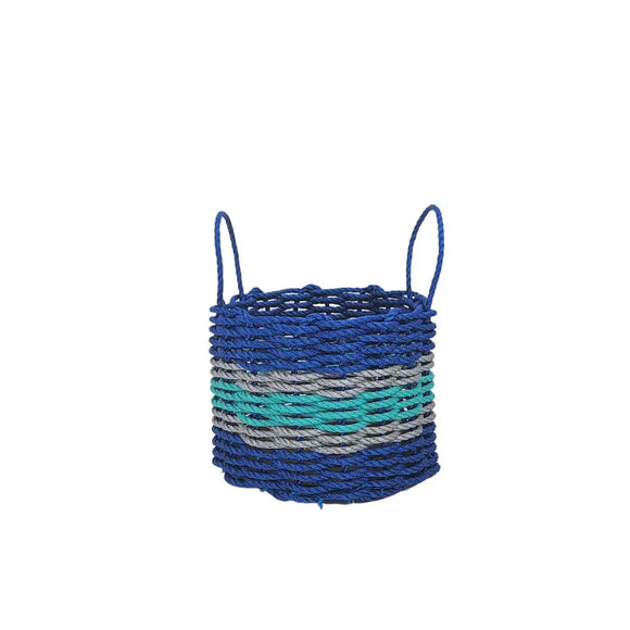 Woven basket with blue, green, and gray stripes on a white background