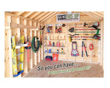 Organized shed interior with tools and equipment on wooden walls, featuring a sign about pride in ownership.