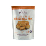 A 307g stand-up pouch of gf Jules Gluten Free Cornbread Mix, featuring an orange and white design with a photo of cornbread slices on a plate.